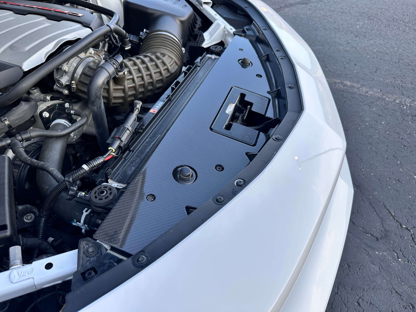 Carbon Fiber-Camaro Radiator Cover In Engine Bay On Road