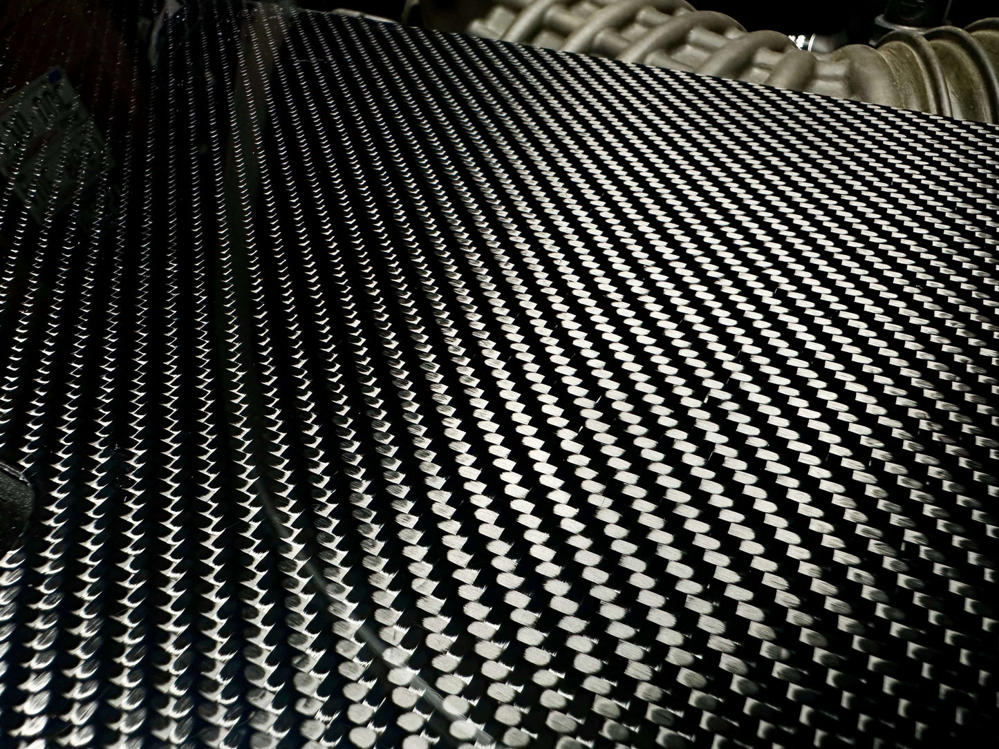 
                  
                    Carbon fiber radiator cover for 2016–2024 Camaro close up
                  
                