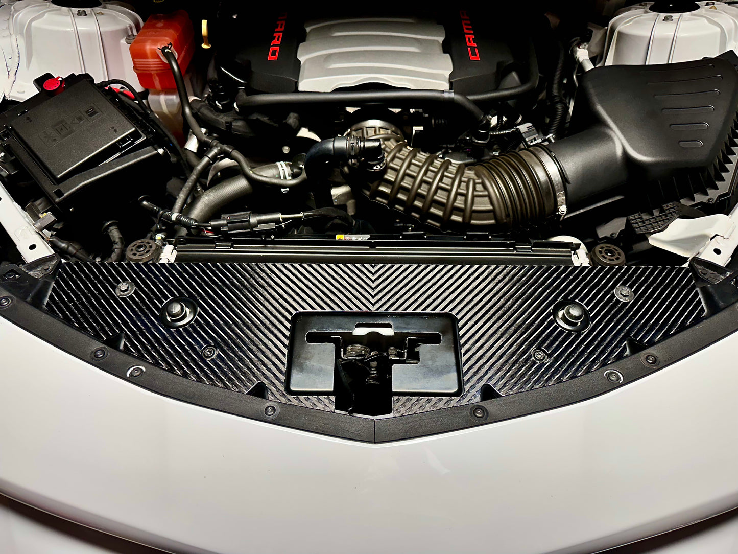 
                  
                    Carbon fiber camaro engine cover 4x4 twill weave installed in engine bay
                  
                