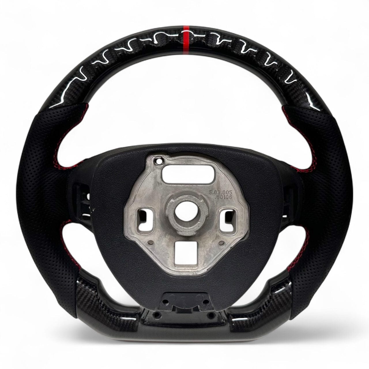 
                  
                    Carbon fiber steering wheel with red accents on white background rear view
                  
                