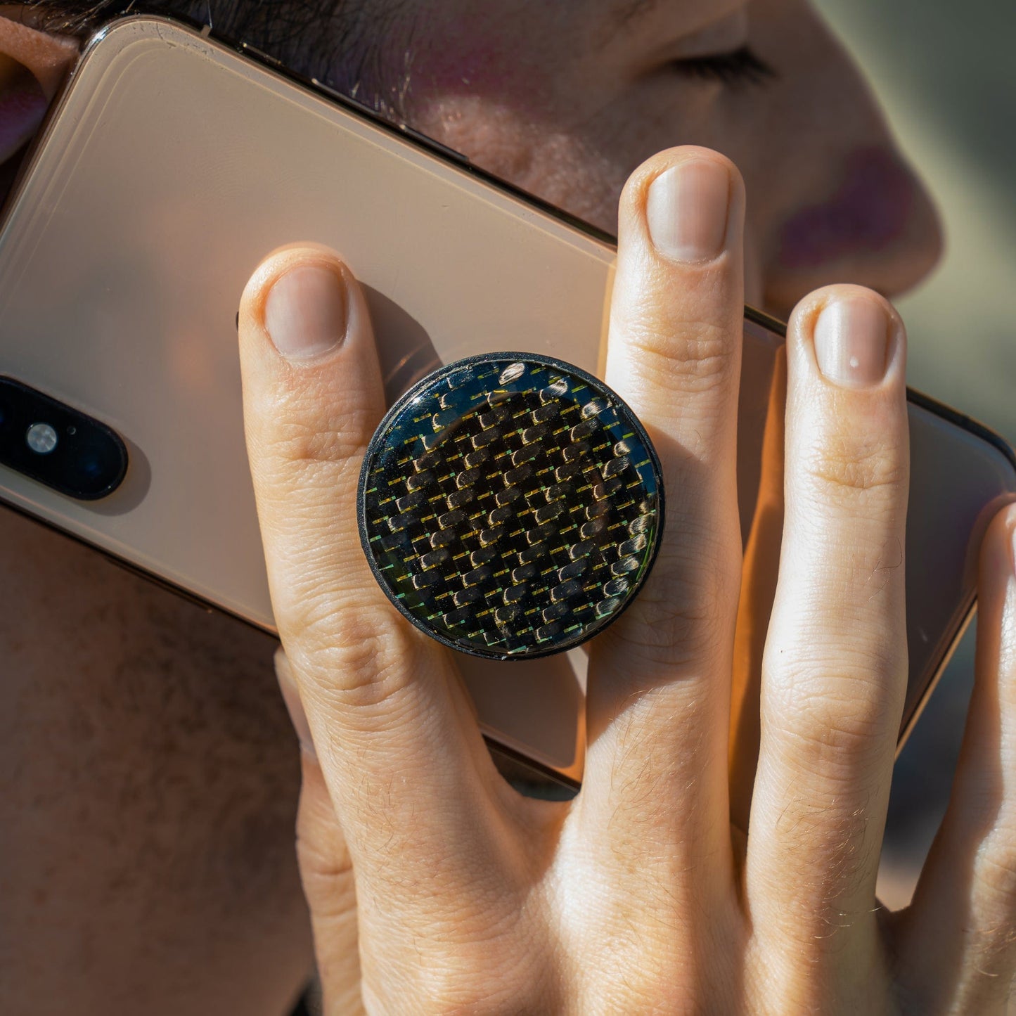 
                  
                    Gold Reflective Carbon Fiber Phone Grip
                  
                